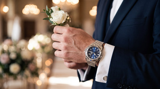 Groom in a navy tuxedo with the DIFFRNT Valois watch peeking from a white shirt cuff